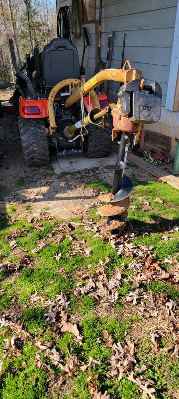 With a full length 48" auger I had about 2" of clearance while moving around. With the compact auger installed I have well over a foot of ground clearance. I have it installed on a linebach line earth auger. My 23hp kubota runs it no problem.
