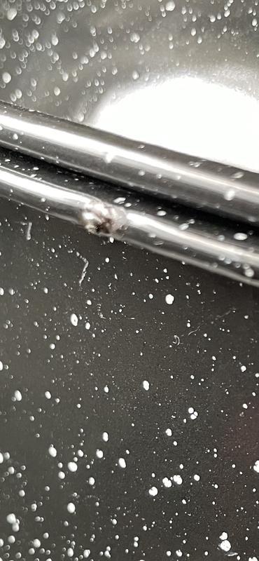 Sharp metal on lip of pot