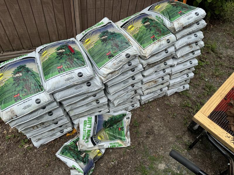 Stack of pelletized lime bags.