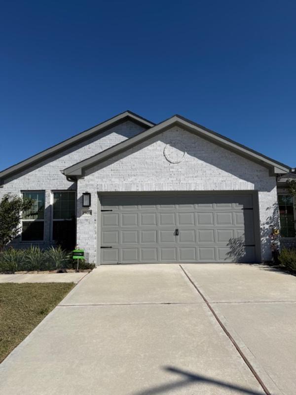 As shown the fence blends well against the foliage of the flowers being green in color