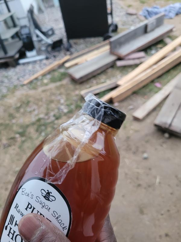 Taped bottle, broken seal
