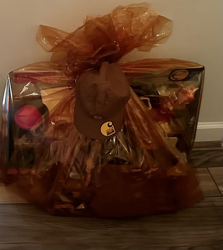 Wrapped the Carhartt clothes with a farm toy set in Carhartt orange film. Even used the Carhartt hat for a bow.