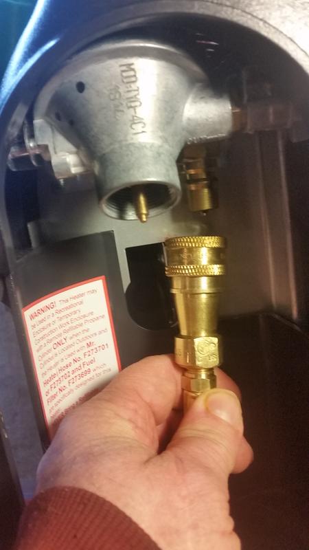 Mr. Buddy 12ft hose quick connect goes on connector to the right and behind regulator