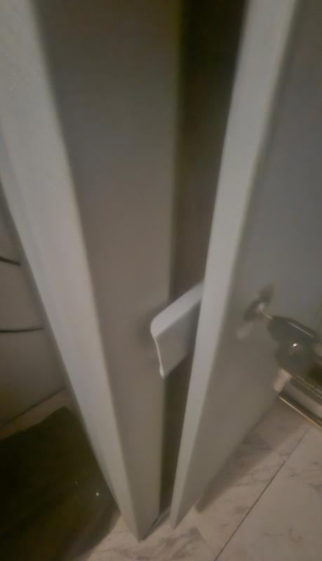 Bottom left corner out of alignment.   Inside of bottom left corner.  Poor locking system.