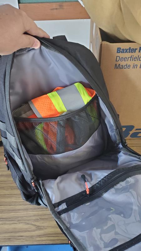 Hi-Vis Vest, Eye protection, hearing protection, and Hi-Vis gloves in pockets.