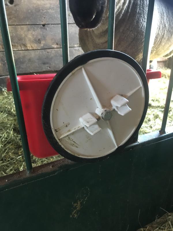 Back of feeder. You can also see the skirt on our panel that doesn’t let the feeder slide, otherwise it would be on the ground. I’d guess anything larger than 1/4” bars and the rubber will grip it and hold it tight where you’d want it. Great feeder though