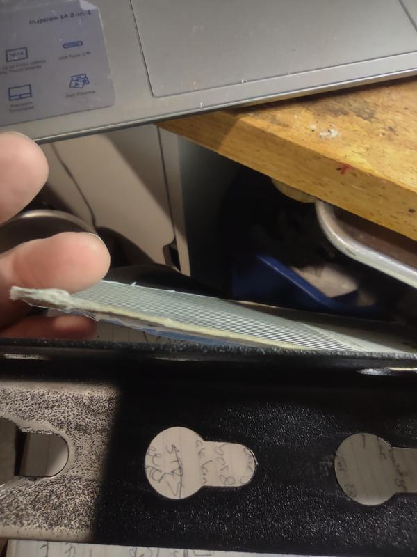 Same thickness as a composition book cover