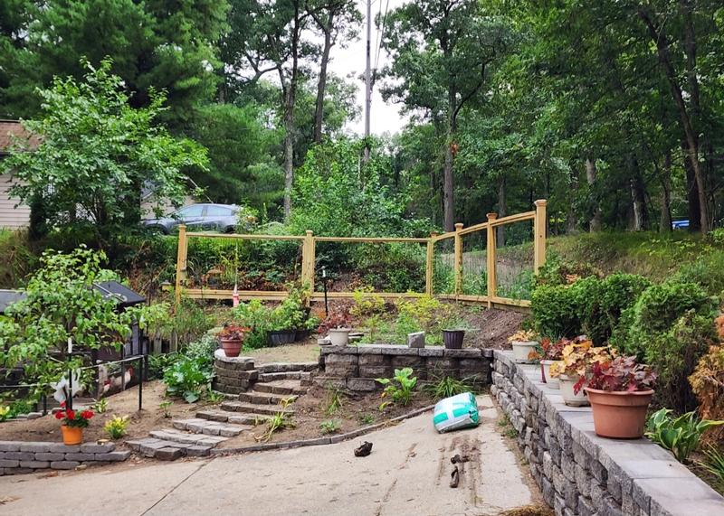 Enclosed fence in wood. A little more classy.