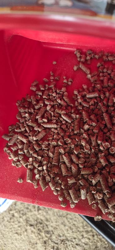 White bags are junk. Scoop is example of size of pellets.