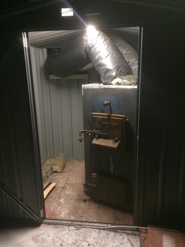 Shed for wood furnace