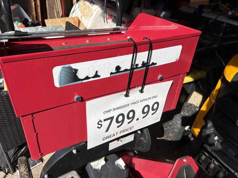 Faded logo and caution tag on gas tank