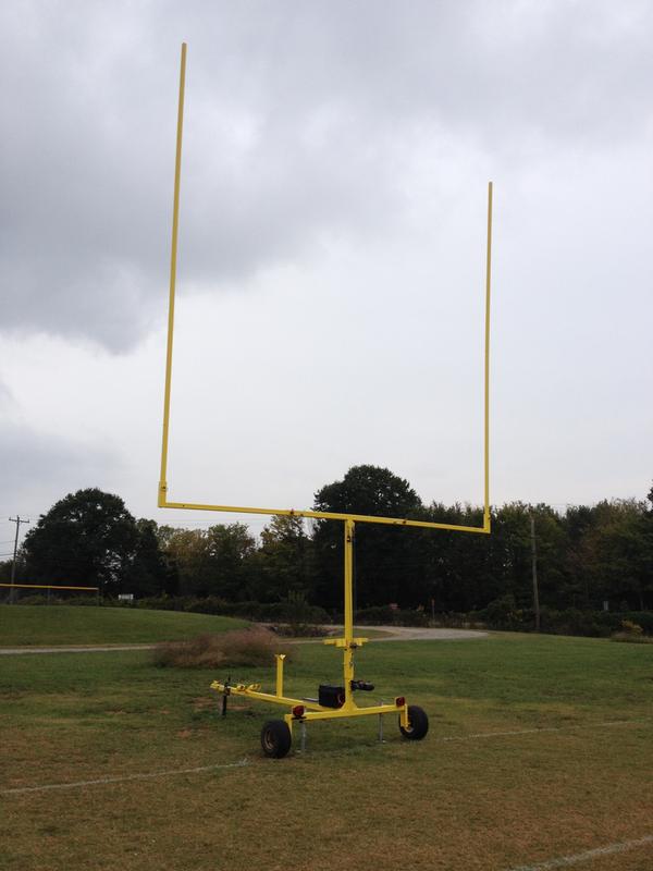 Regulation size goal post raised. Tuf-Tug pulley wheels are part of the electric winch system
