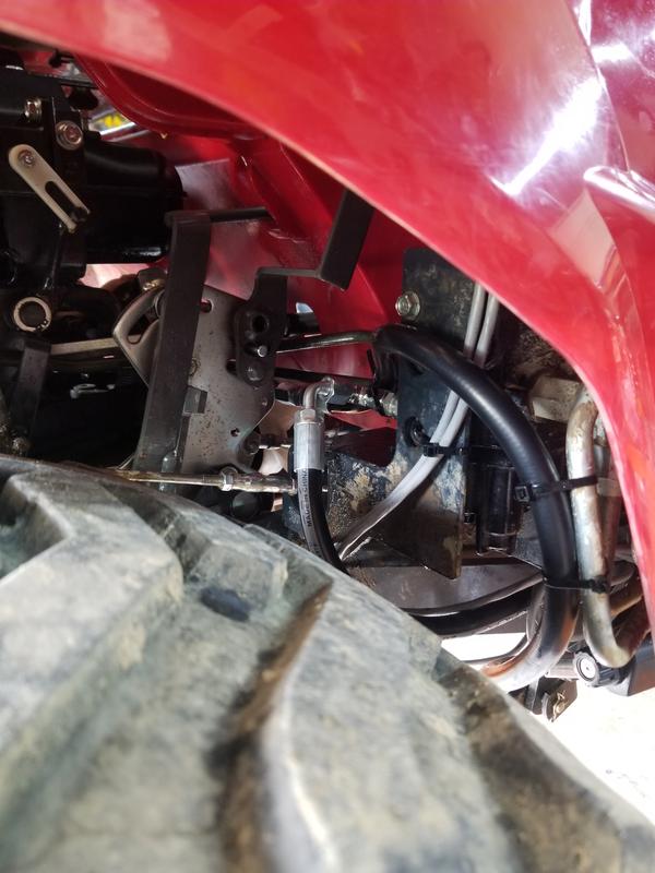 Its a in series set up on subcompact and compact tractor open center systems