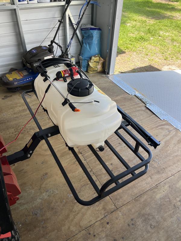Mounted with tie wraps onto ATV rack and attached to the receiver on my tractor.