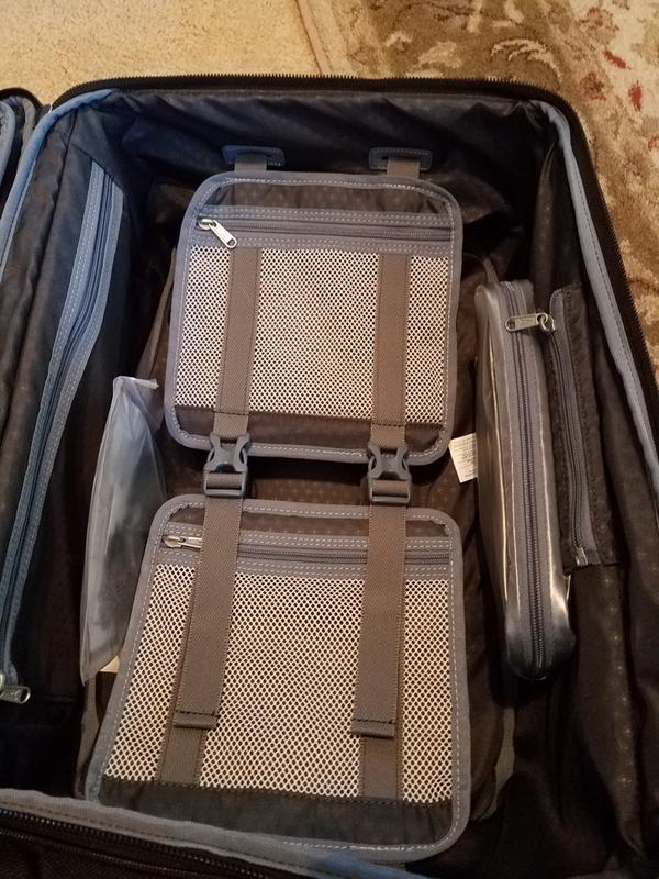 Love the small zippered compartments.  You can see the removable TSA bag on the right.