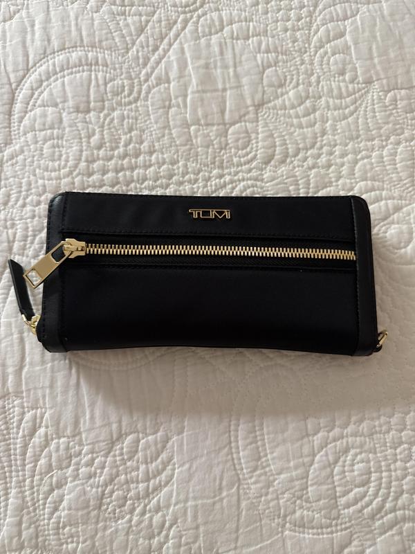 My beautiful wallet, I love it! Tumi is best! I love my purse, wallet and carry-on!