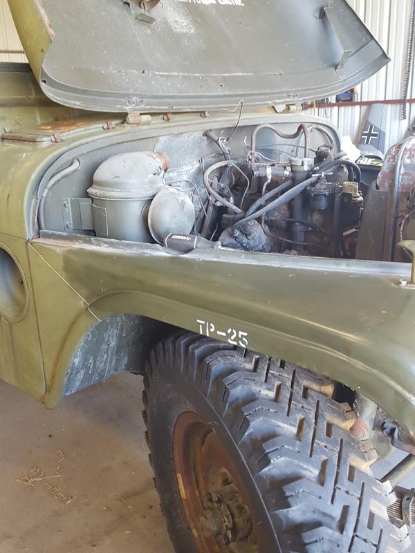 First coat on my M38A1 and the 40 year old oxidized paint.