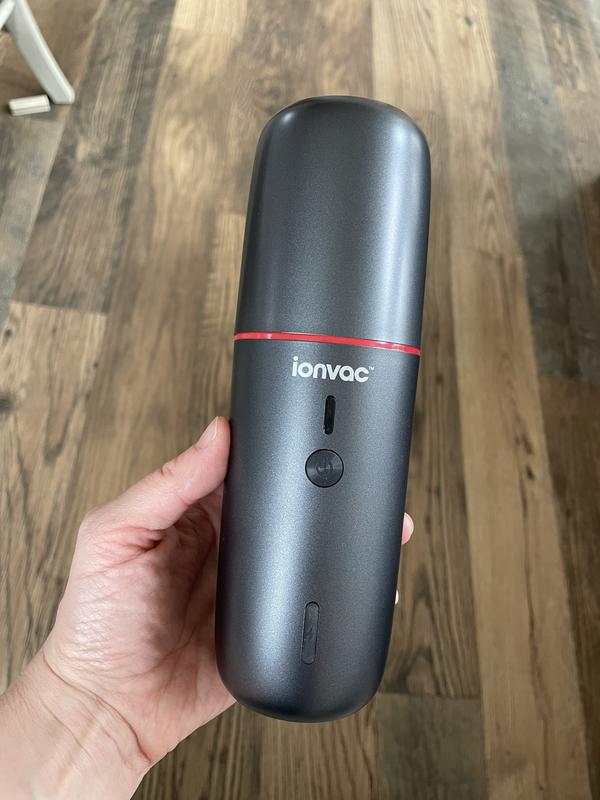 Hand vac with cover on