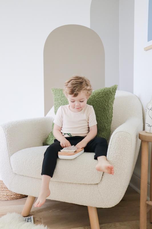 Sitting still and playing quietly!