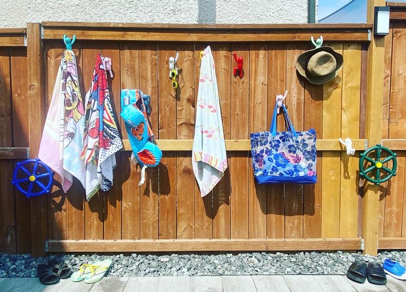 Buddies climbing the fence, running from pool pirates