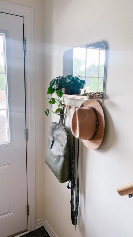 Entrance mirror with discount hooks