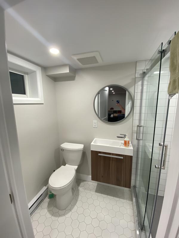 Tiny basement bathroom, wanted a small mirror that didn’t take up too much space.