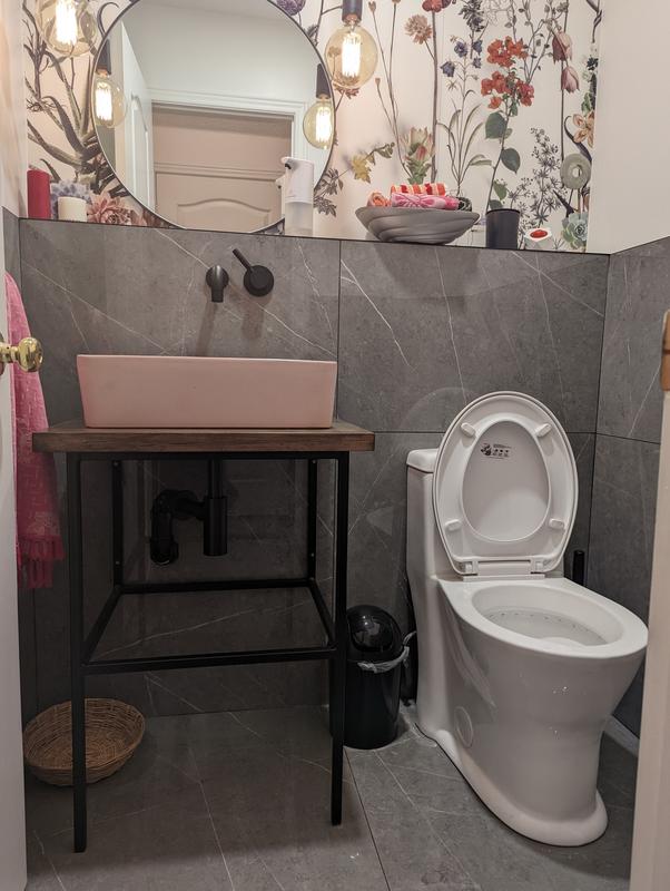 Mini trash can in newly designed powder room