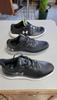 The shoe in the foreground of both photos are the shoe of review. The others are previous generations