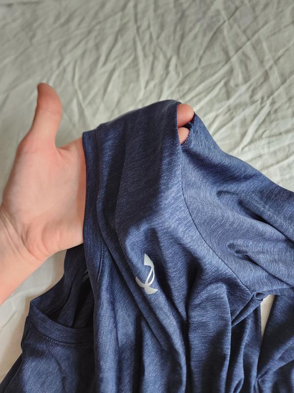 Poor stitching at shoulder seam leading to hole after 2 washes