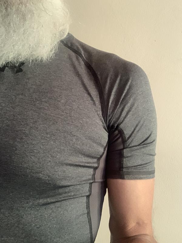 Extremely tiny arm openings causing short sleeves to bunch up in armpit around shoulder