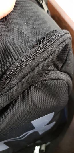 Tear in the seam of main compartment