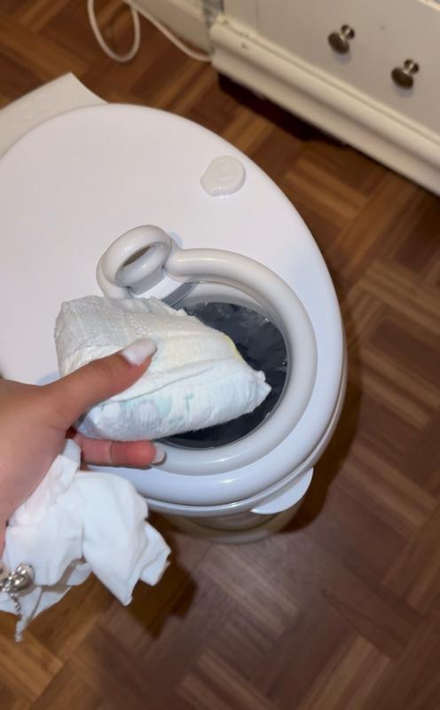 Customer photo for "The Ubbi diaper pail is super practical and keeps odors contained really well. I also love that it works with regular trash bags 💖✨"