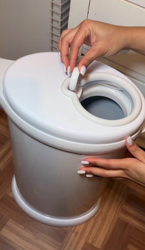 Customer photo for "The Ubbi diaper pail is super practical and keeps odors contained really well. I also love that it works with regular trash bags 💖✨"