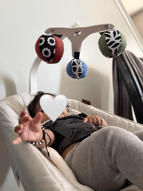 He enjoys the soothing movement on the swing