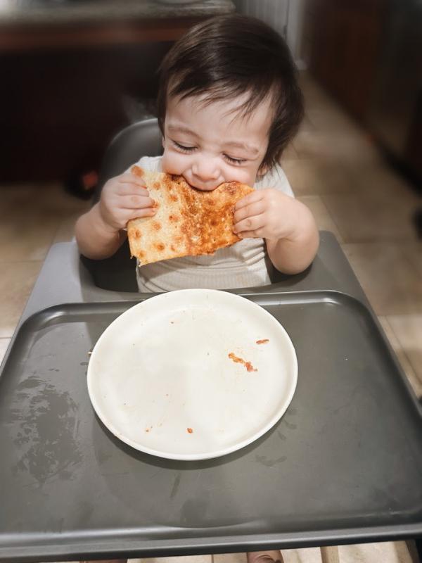 One year old approved for pizza eating!