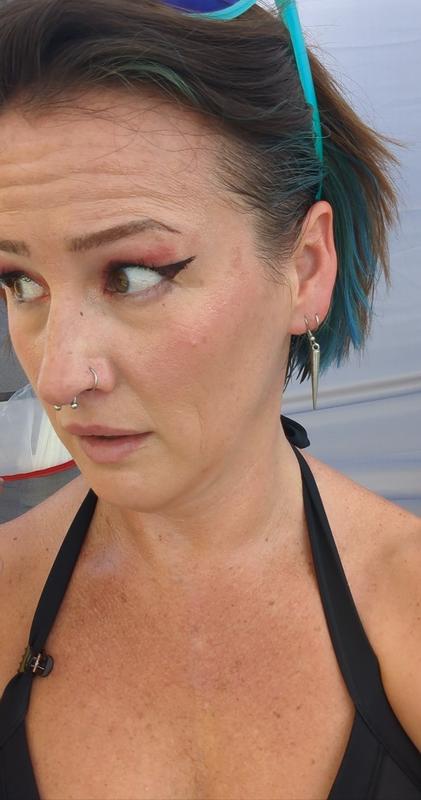 Dark drapes after a downpour at a rock fest