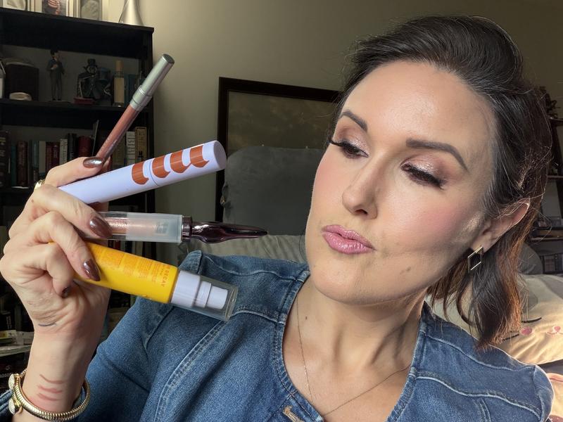 Lip bond in cuffed with Vice shine local lipstick layered on top