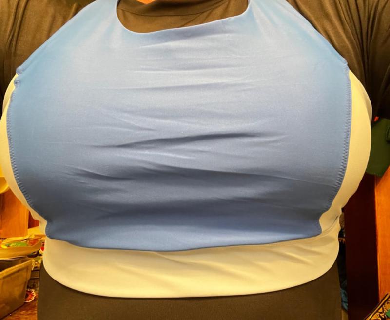 Customer photo for "Swimmer and weightlifting transgender woman with implants"