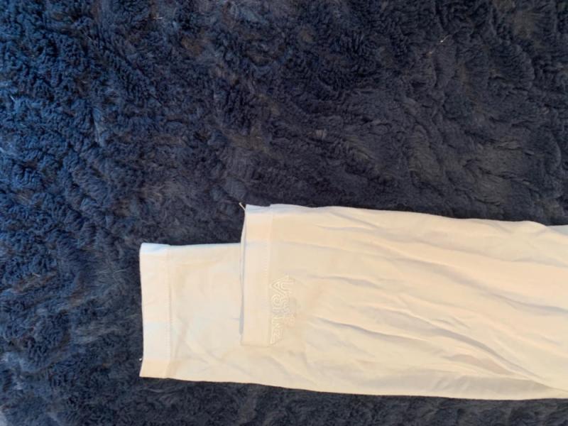 Customer photo for "Nice fabric and beautiful look but the arms were different lengths."