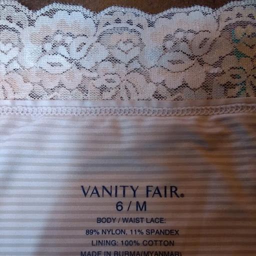 Detail of the lace waist band and the fabric content