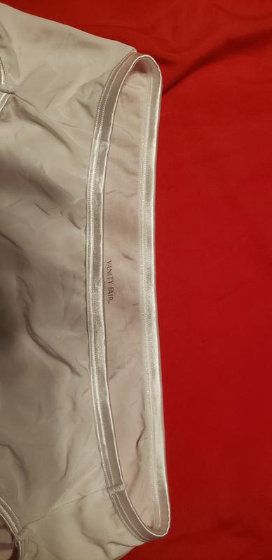 Nice comfortable satin waistline. No pinching or too tight.