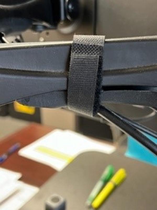 holding cables to monitor stand