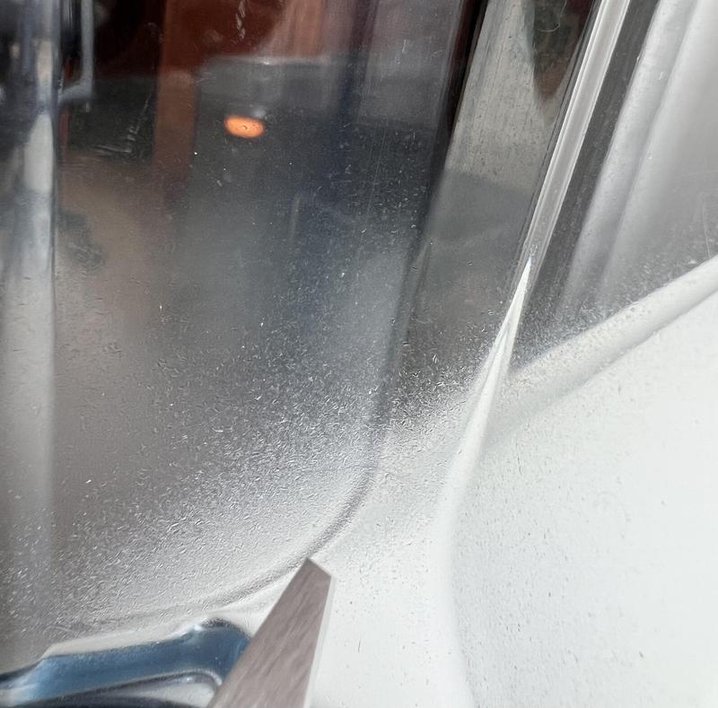 Pockmarks inside of dry grains container from wheatberries