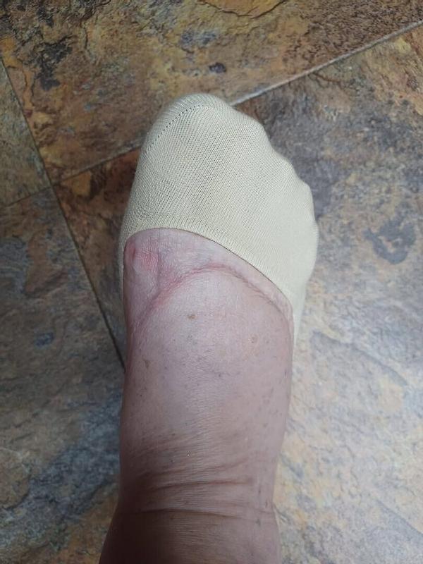 Customer photo for "Not for wide feet."