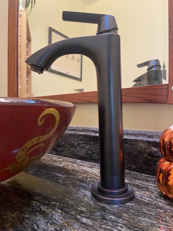 Begonia Matte Stone Vessel Bathroom Sink in White with Linus Vessel Faucet in Antique Rubbed Bronze Begonia Matte Stone Vessel Bathroom Sink in White with Linus Vessel Faucet in Antique Rubbed Bronze