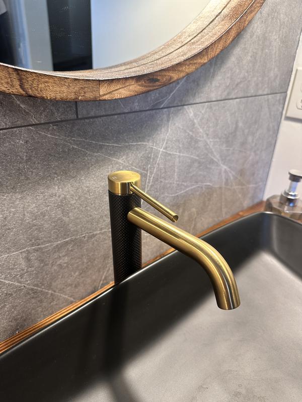 Stunning with our dark sink and gray tile