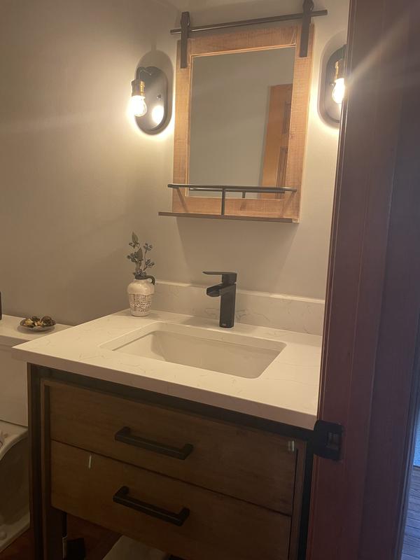 Vigo VG01042MB Ileana GPM Single Hole Bathroom Faucet in updated powder room.  A statement and fun to use!