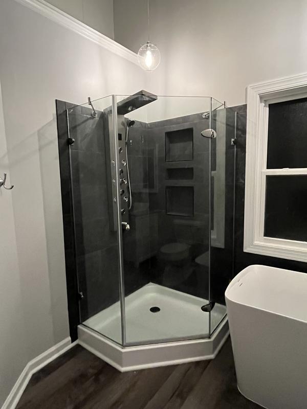 Bathroom before curtains on the windows.