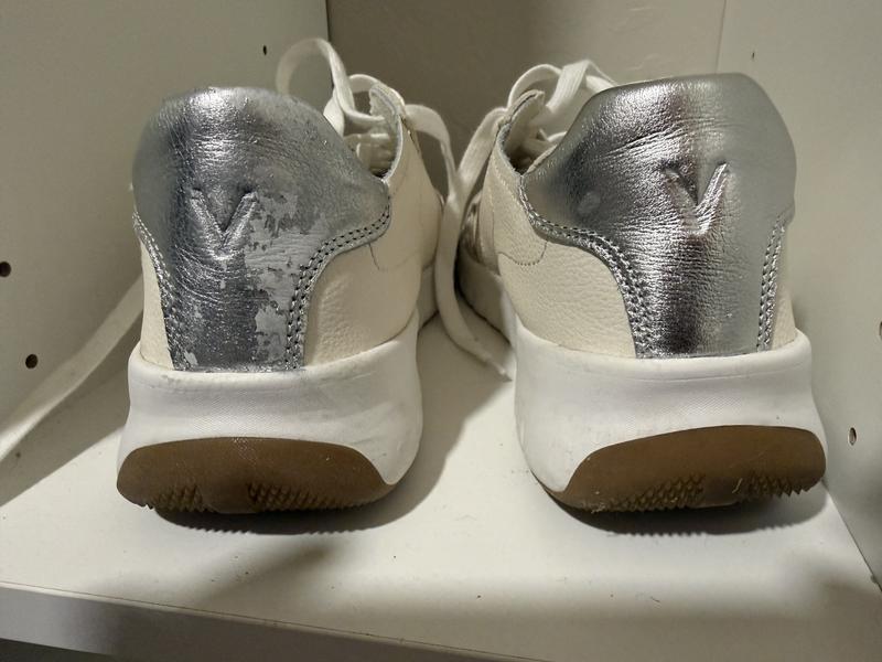 This shows the further loss of silver from the left shoe after three days of wearing.