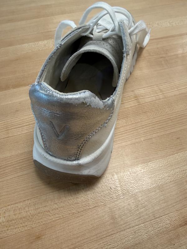 After two days of wearing the shoe I noticed the silver rubbing off the back of the left shoe.
